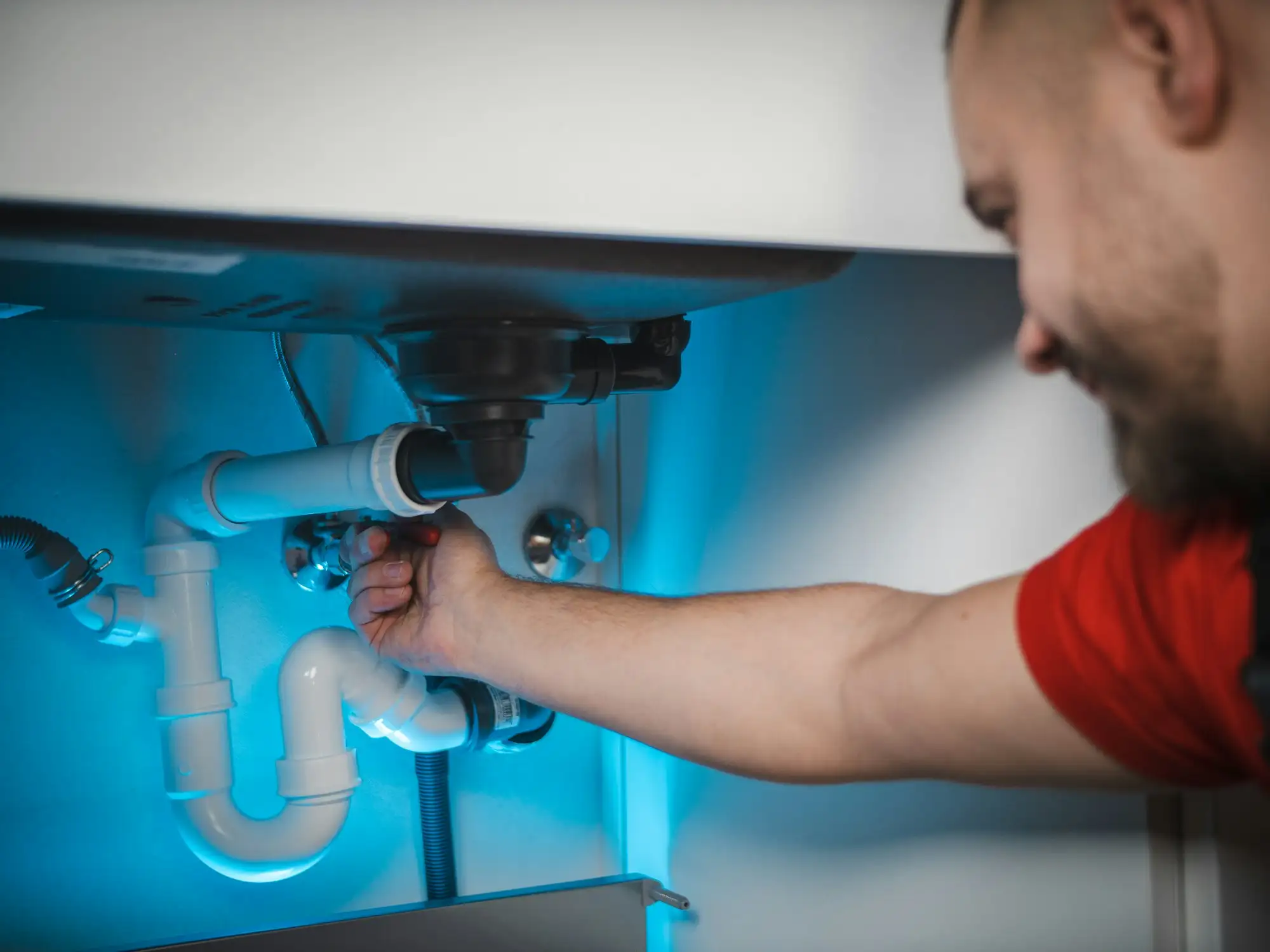 Plumber fitting copper pipework on an Australian residential job