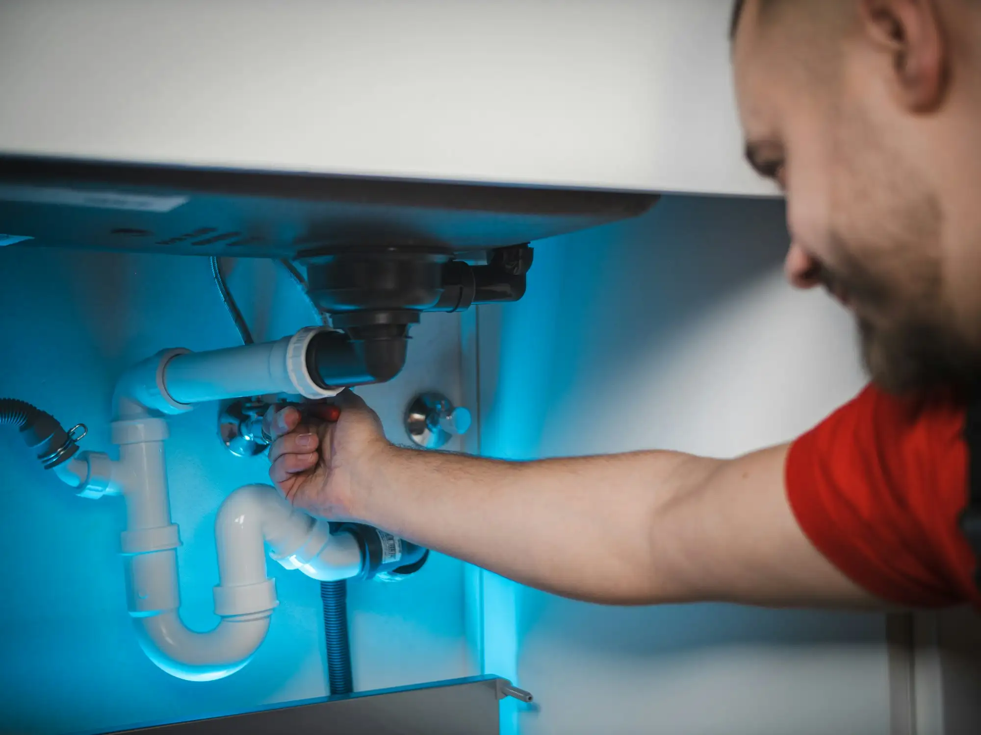 Plumber fitting copper pipework on an Australian residential job