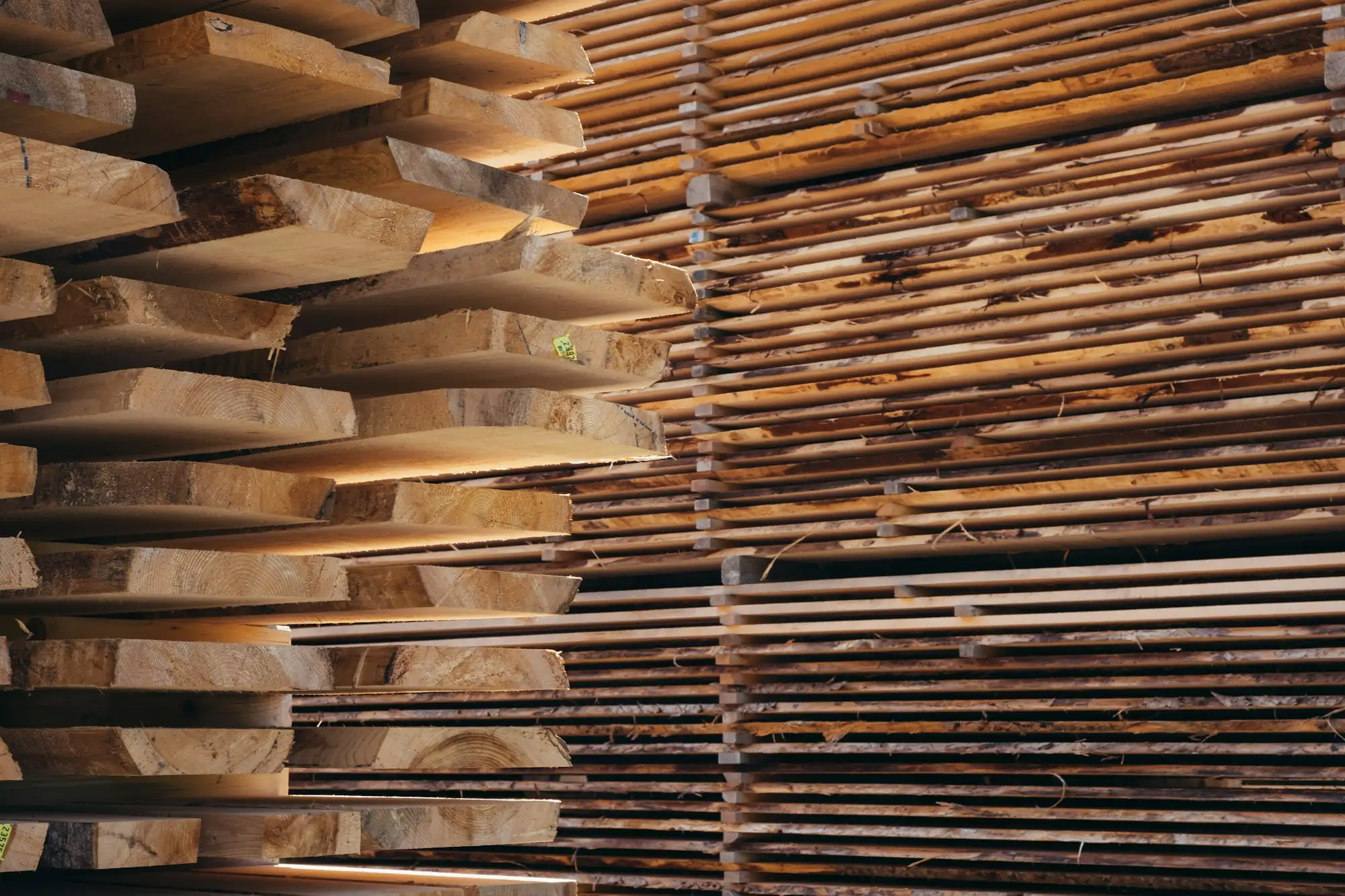 Stack of timber and building materials ready for delivery to a site