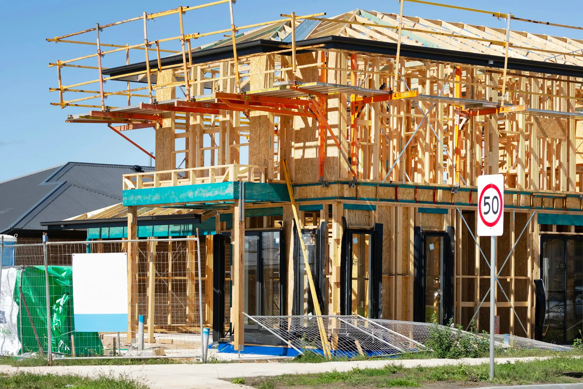 Double storey home under construction on an Australian residential street