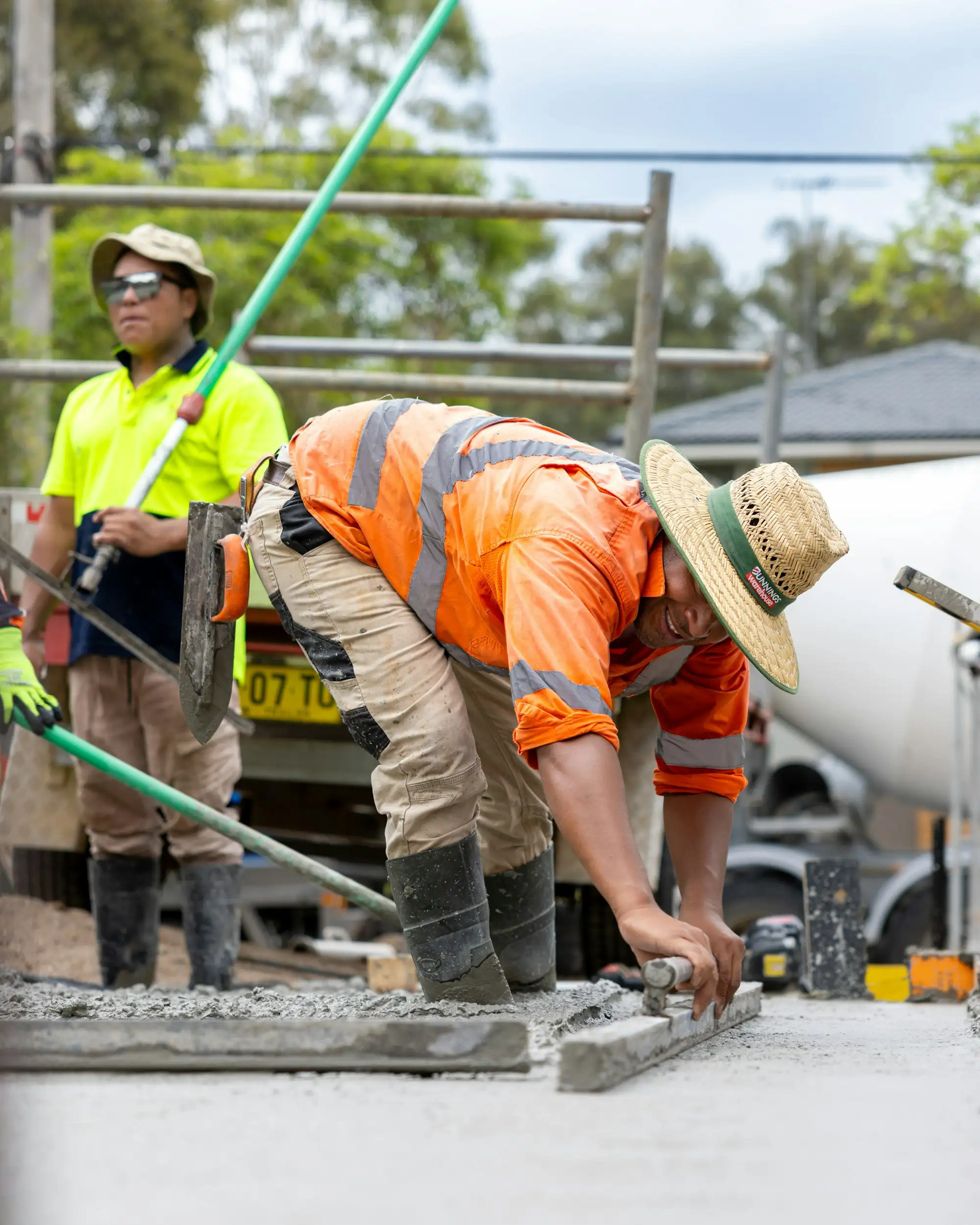 Subcontractors working together on an Australian residential building site